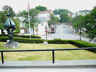 Spring Street in Hastings on Hudson NY from the library with Jacques Lipschitz sculpture in foreground