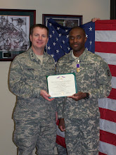 MG Bunting presenting SGT Hill with Purple Heart