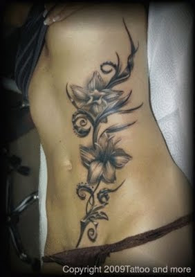 Womens+tattoos+on+sides+of+body