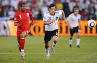 South Africa - Football - Germany v England FIFA World Cup Second Round - South Africa 2010 - Free State Stadium, Bloemfontein, South Africa - 27/6/10..England's Ashley Cole (L) and Germany's Mesut Ozil in action.