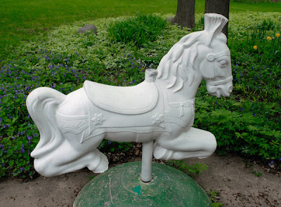 vintage garden playground horses sculpture