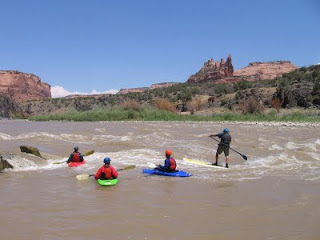 Charlie MacArthur and his students at the 'Little D' rapids in Westwater Canyon Charlie MacArthur and his students at the 'Little D' rapids in Westwater Canyon