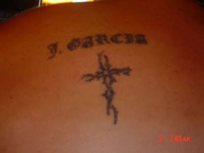 GD Tattoo #38 J. Garcia with cross. Found tattoo from Rate My Ink,