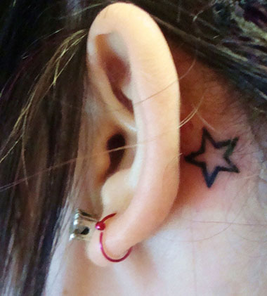 star tattoo behind ear. Behind ear star tattoo design