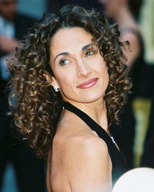 melina kanakaredes curly hair style 2010 Medium Length Curly Hairstyles for