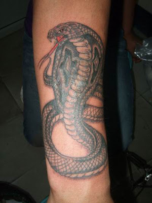 Info: snake tattoo done by Mick TATTOO ART: The Mystifying 3D Tattoos -Get a