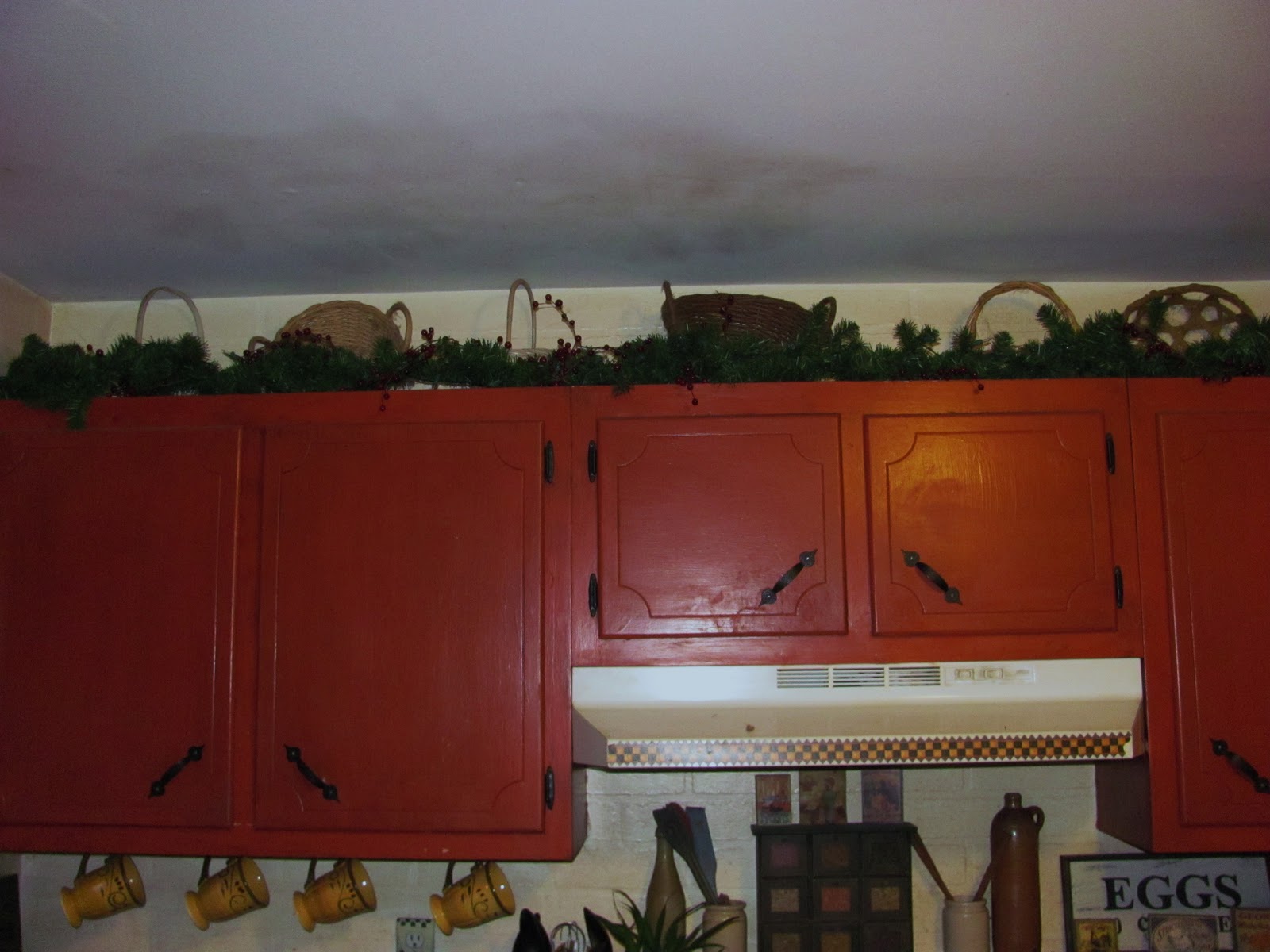 Old fashioned kitchen cabinets Christmas Garland above Kitchen Cabinets