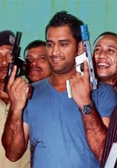 Dhoni with Gun