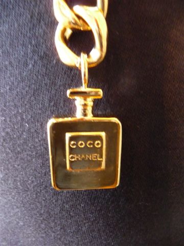 [Chanel+gold+chain+perfume+bottle]