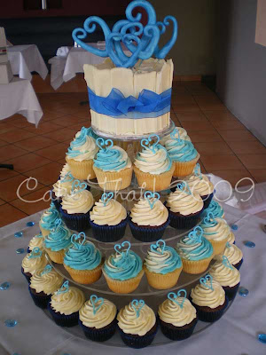  with the blue colour used throughout the wedding this cupcake tower was 