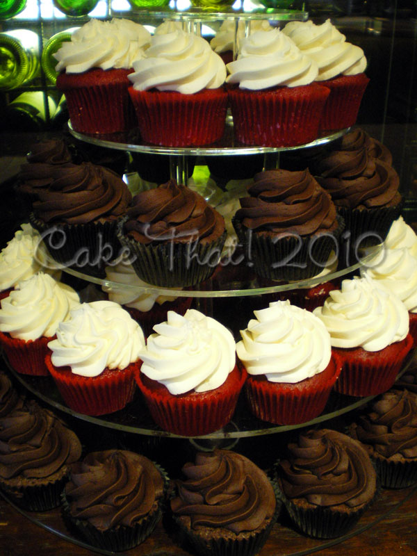 The wedding Red Black and White theme was resonated in this cupcake tower The wedding Red Black and White theme was resonated in this cupcake tower