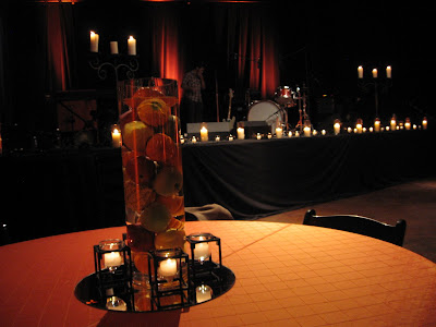 These centerpieces were filled with small pumpkins apples and other fall These centerpieces were filled with small pumpkins apples and other fall