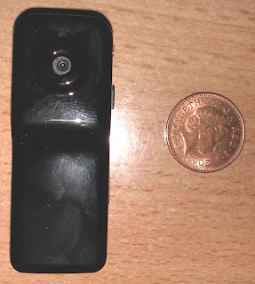 The camera and a UK penny
