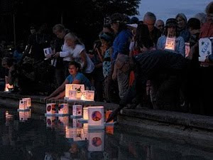 At the reflecting pool, camp members float Japanese paer lanterns in the pool as a symbol for peace