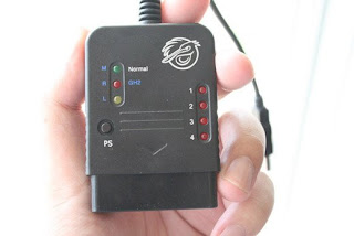 Pelican PS2 to PS3 controller adapter.
