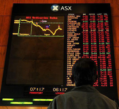 Image of Stock Market display screen displaying losses - mocked up to look like a game of Scramble.