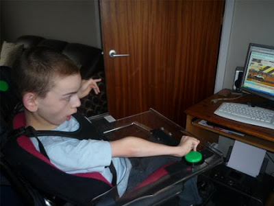 Colin McDonnell playing a web-game using switches and a C-SID switch interface.