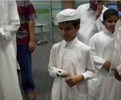The same young lad getting to grips with V.I. Tennis.