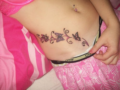Woman tattoo ideas butterflies tattoos pink colours design