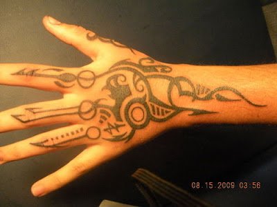 Japanese Tribal Hand Tattoo Design