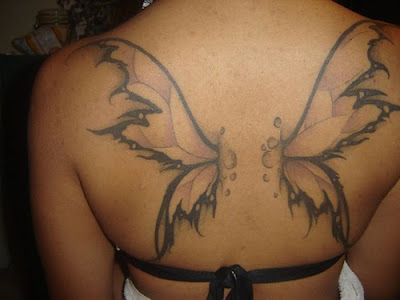 Bullet With Butterfly Wings Tattoo