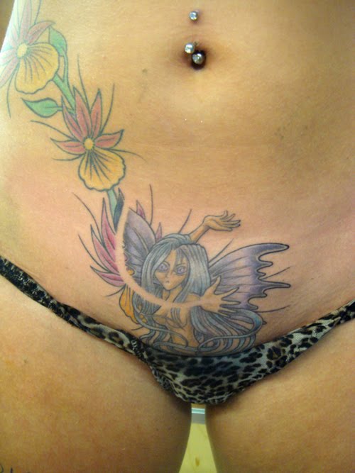 Cute Girl Fairy Tattoo On The Lower Back tattoo