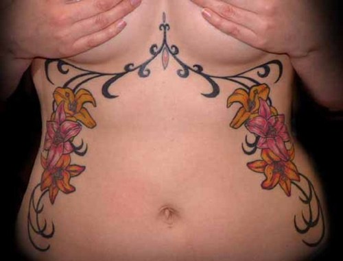 Tribal Tattoo With Flowers Tattoo. Posted by BUCHUS at 10:03 AM