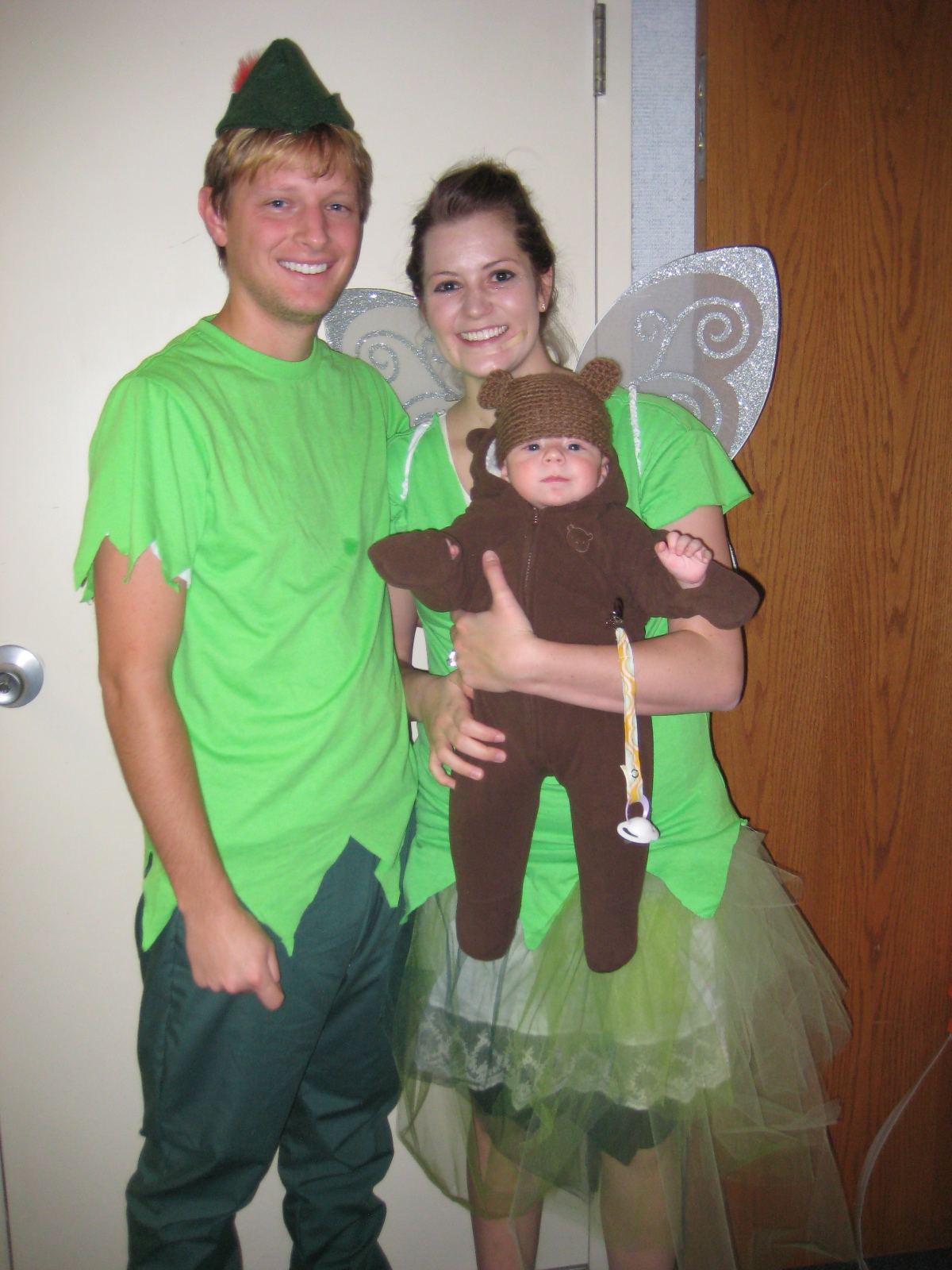 halloween is so fun i love watching the costumes come together im a big fan of group costumes especially when there is a baby involved peter pan