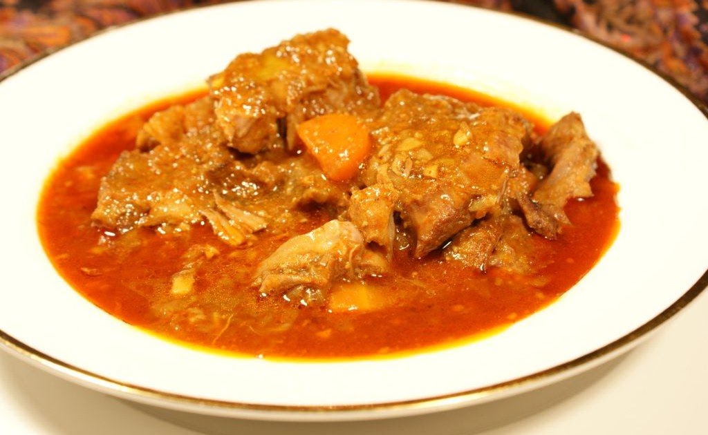 The Curry Secret Lamb Tagine with Saffron, Raisin and Mint Couscous and Harissa