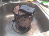 Off with a sponge! It comes off with a sponge or a brush