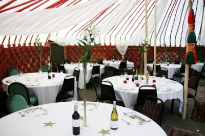 Tables in half of the Yurt Tables in half of the Yurt
