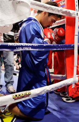 Pacman praying before the fight..