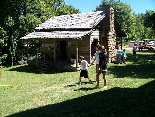 Visitors enjoy the 1861 Payne Cabin full of history