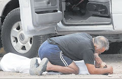 A Father Say's Goodbye, His Mother Cries Nearby