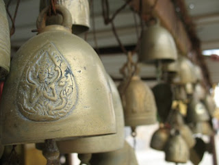 Prayer bells were ringing in the wind