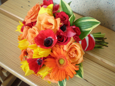 Gerber Daisy Wedding Bouquets Pictures on Bridal Bouquet Composed Of Orange Gerber Daisies  Orange Roses