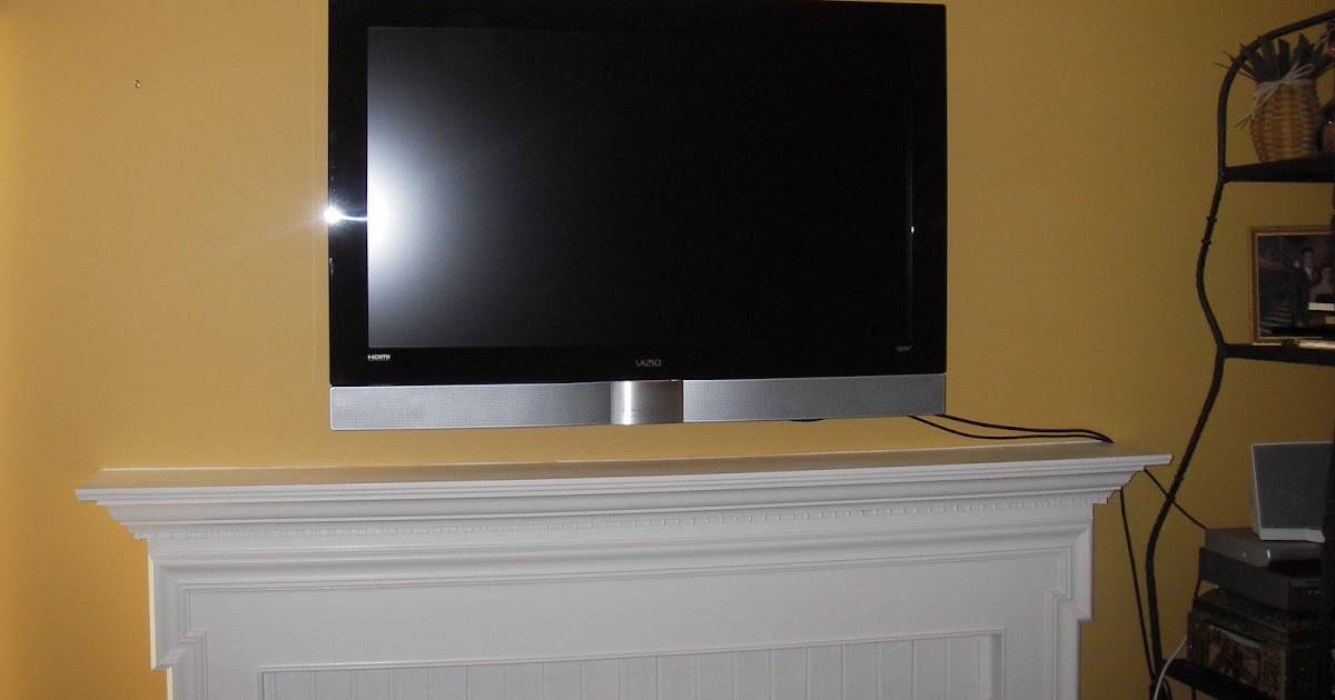 FranklyBeans Flat Screen TV above the fireplace mantel idea/solution