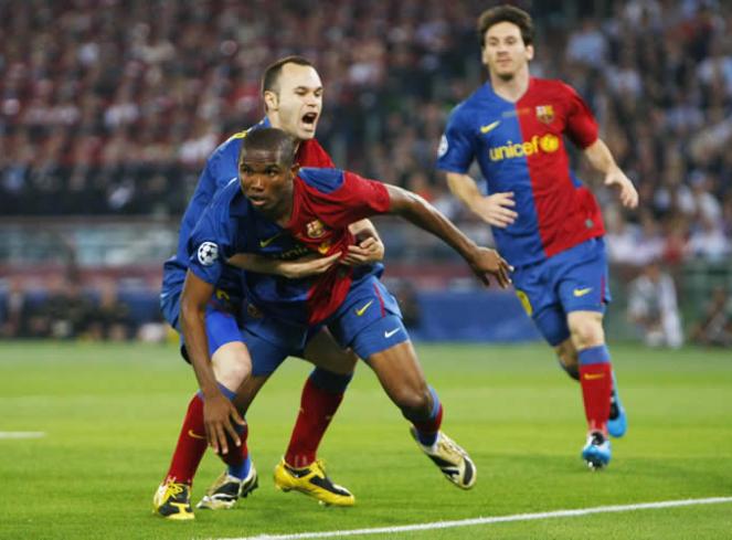 [0+barcelona+man+united+iniesta+grabs+eto'o.jpg]