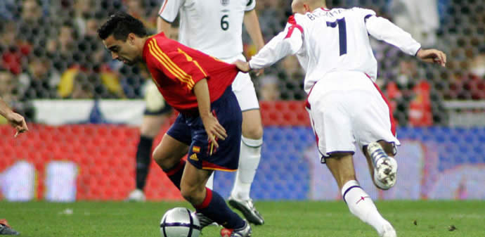 [xavi+vs+beckham.jpg]