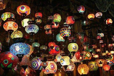 A collection of glass mosaic lamps.