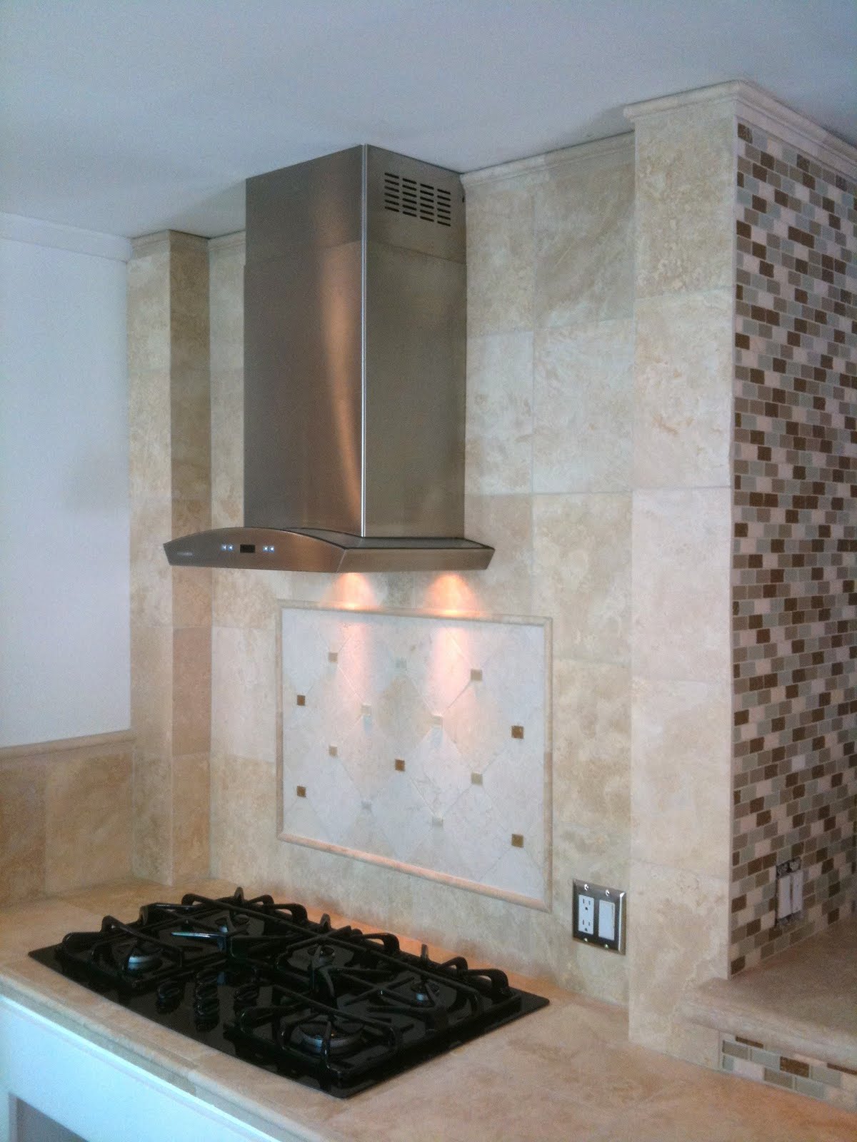 Custom kitchen cabinets los angeles New cook top and vent fan to add a splash of elegance.