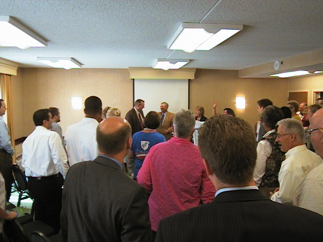 [tester+talks+to+delegation.JPG]