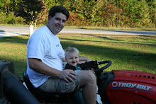 Big Bro Spence mowing with daddy