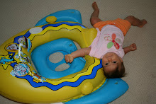 She loved bouncing in the tube and rolling around
