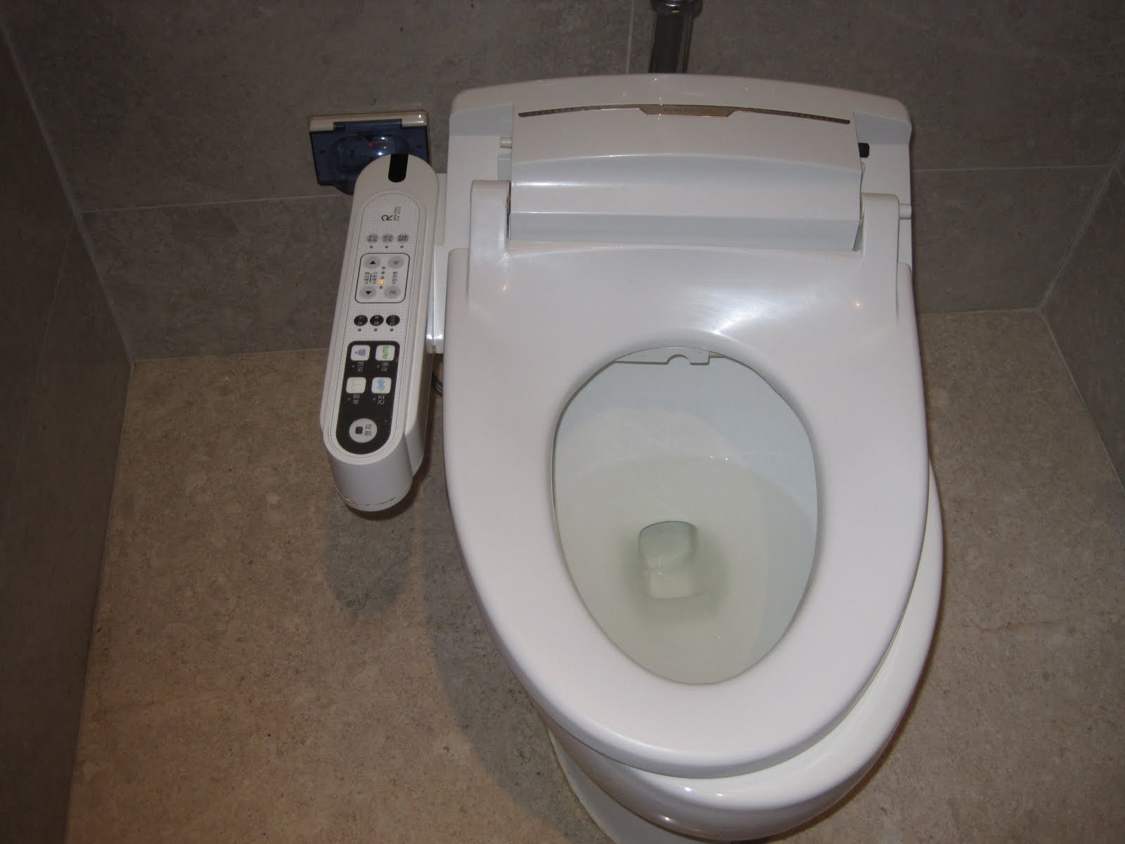 2Wheels2Laos What happens when the airport toilet goes hitech?