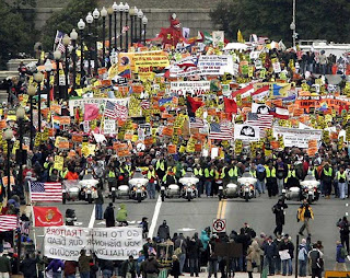 Demonstrators opposed to the Iraq war march across the Memorial Bridge in Washington, D.C.(J. David Ake / Associated Press)Mar 17,2007