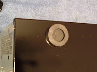 Before fastening the feet to the case