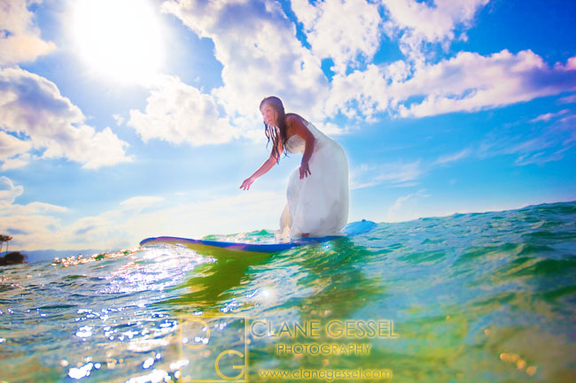 hawaii underwater photography, bride surfing in her wedding dress pictures