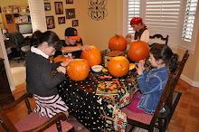 The kids carving pumpkins 2010