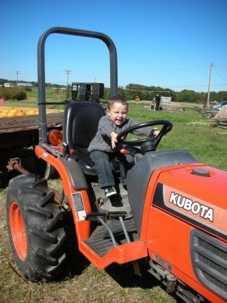 [alex+on+the+tractor.JPG]